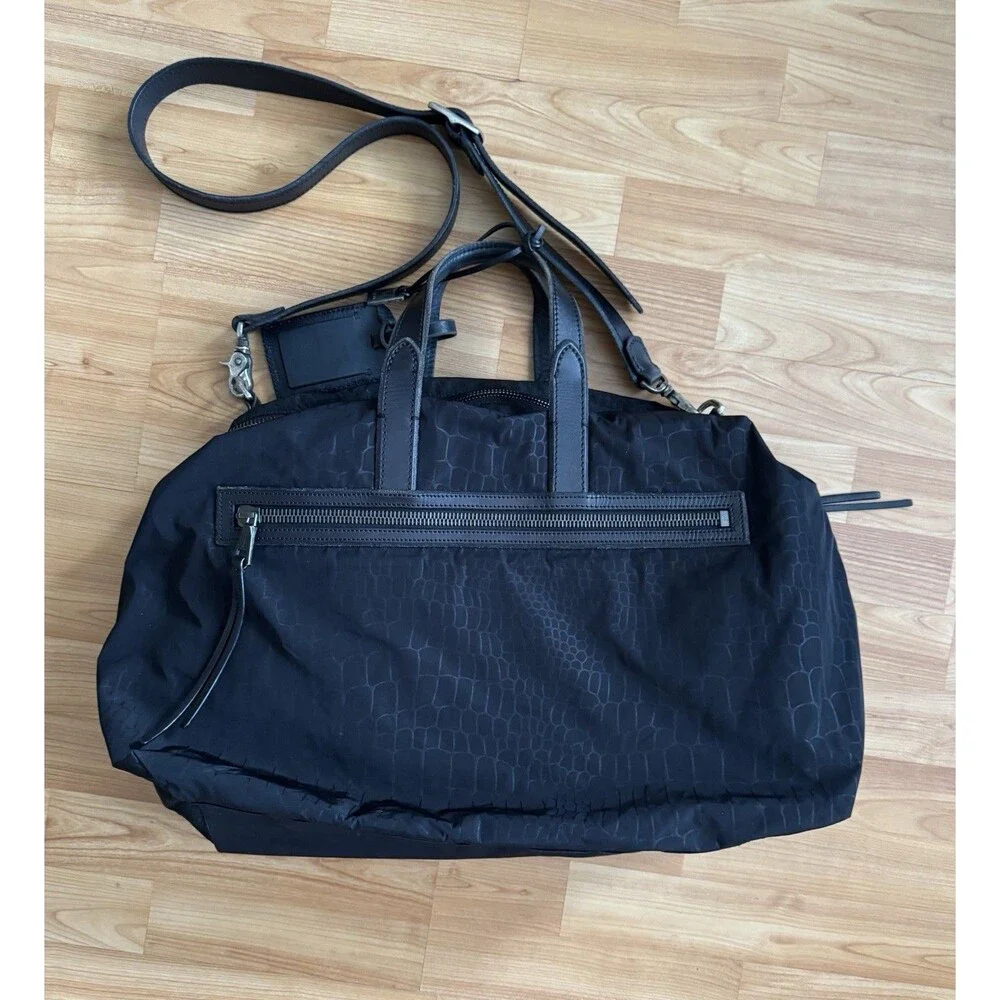 John Varvatos retail compartments luggage